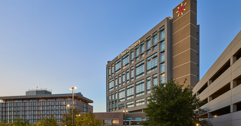 Exterior view of El Paso Children's Hospital at University Medical Center of El Paso at dusk.